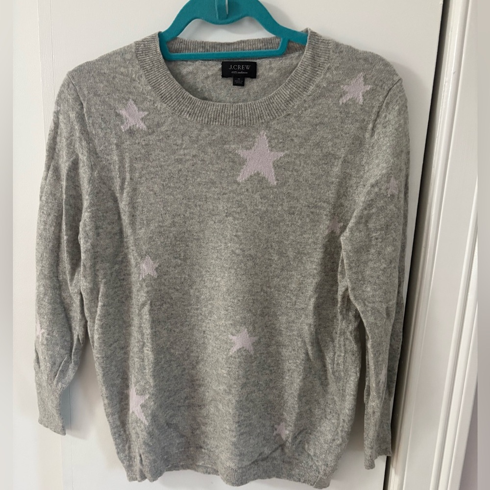 J crew. Women’s size M cashmere sweater. Light gray with light lavender stars!